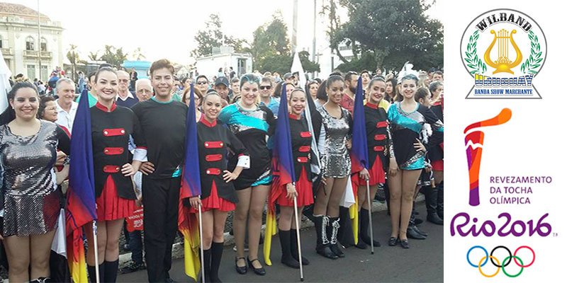 Wilband Uruguay junto a la llama olimpica